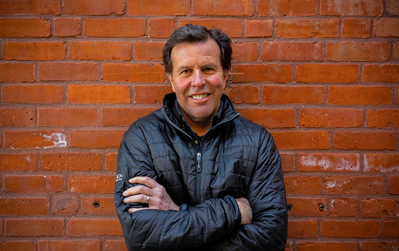 Tony Post with brick wall background